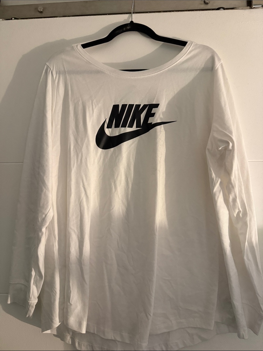 Nike White Long Sleeve Tee with Black Swoosh Logo